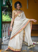 Off White Mulmul Cotton Saree With Zari Border